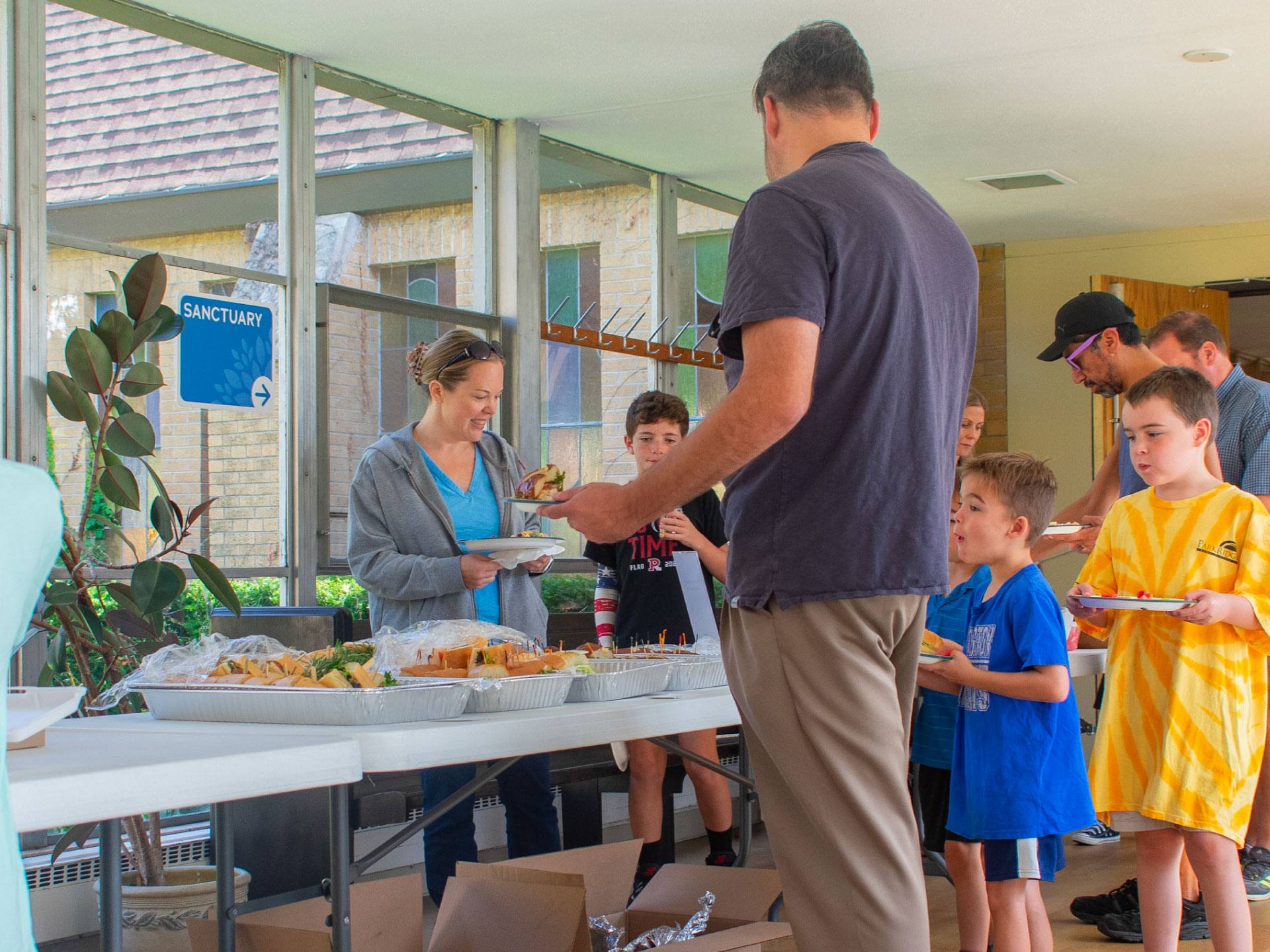 Members sharing a meal together at Redeemer